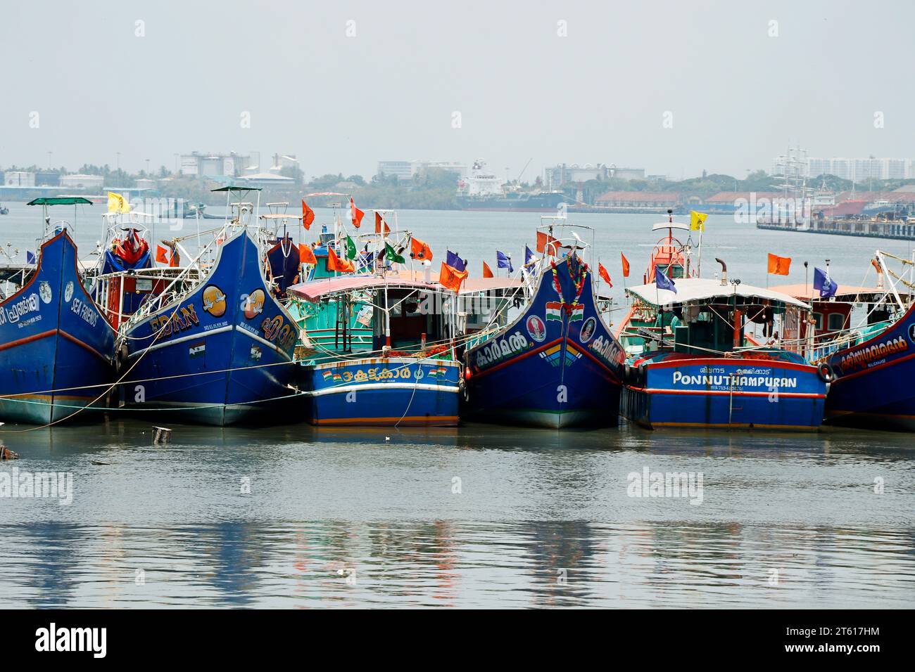 kerala, India- March 25, 2023 fishing boats halted in fort kochi boat yard during trawling ban in kerala Stock Photo