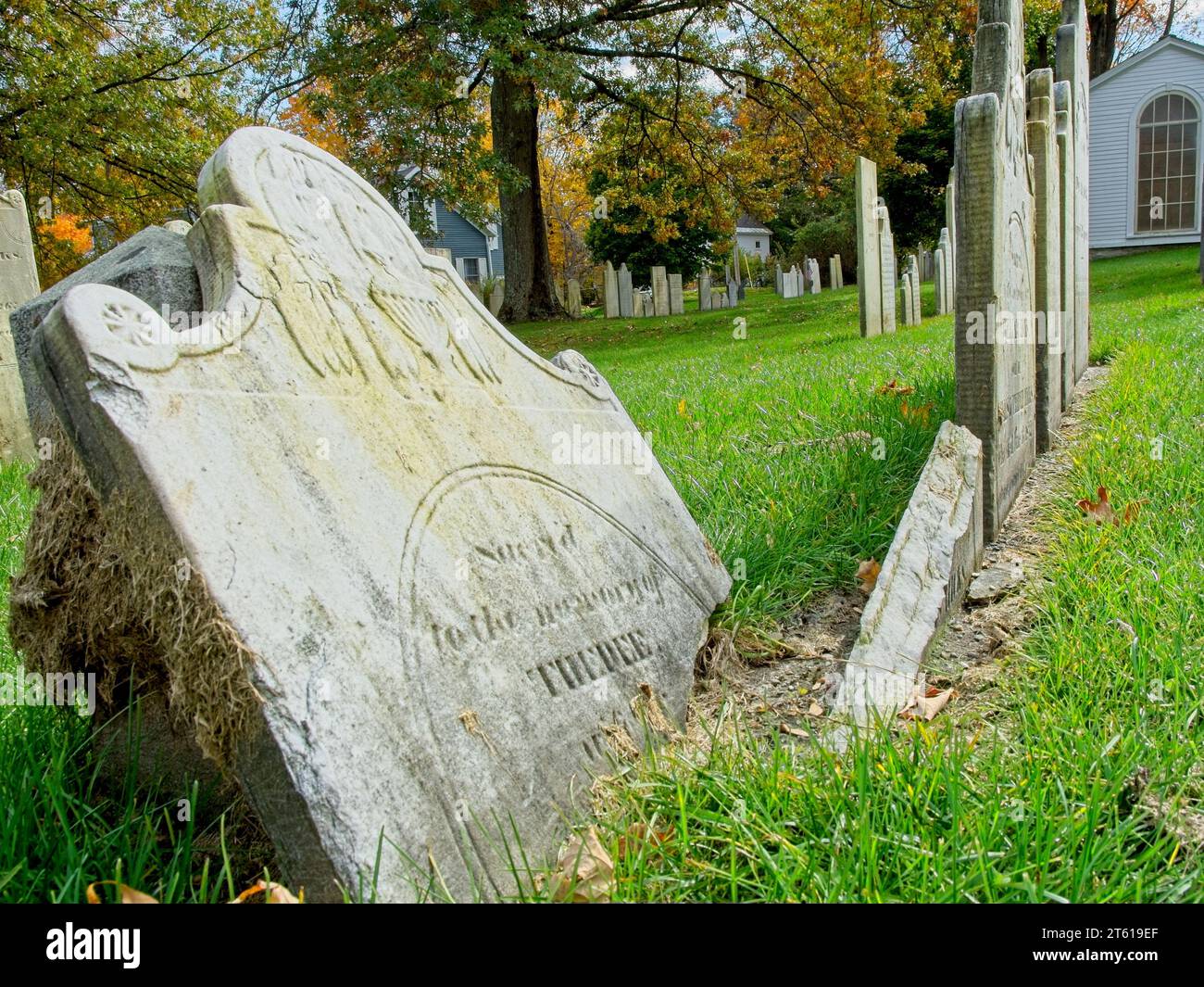 Close up of broken headstone at 1806 Old First Congregational church cemetery  in Bennington Vermont Stock Photo