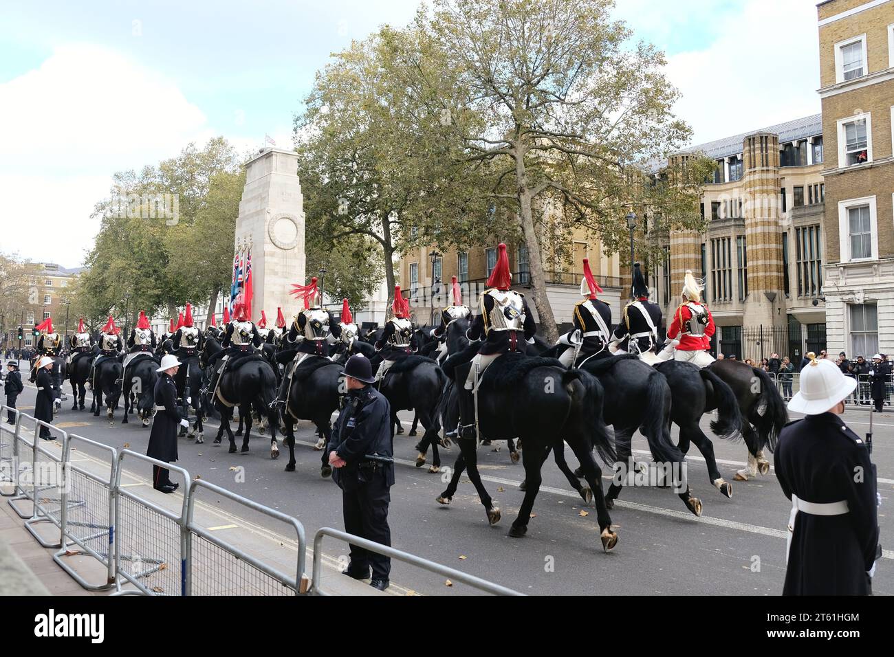 London, UK. The Household Cavalry Mounted Regiment pass the Cenotaph after the State Opening of Parliament ceremony. Stock Photo