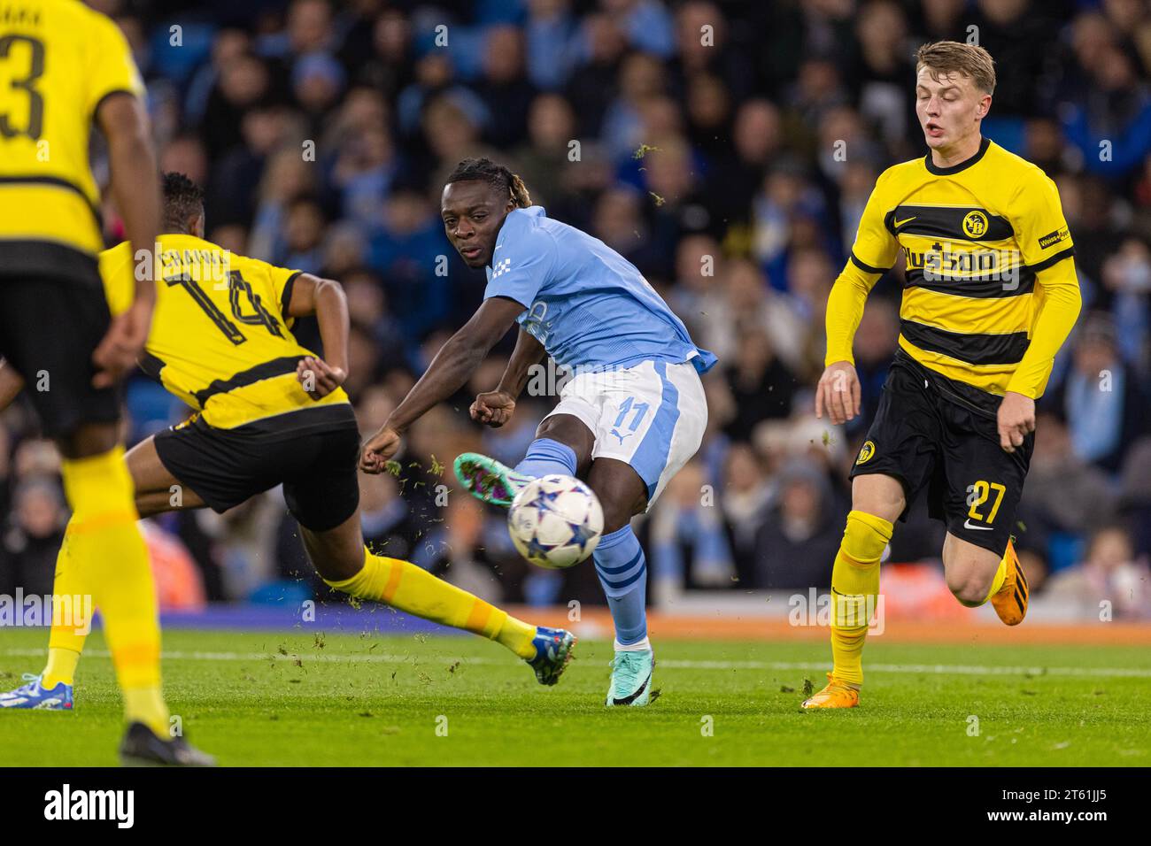 Manchester, UK. 8th Nov, 2023. Manchester City's Jeremy Doku (C) shoots during the UEFA Champions League Group G match between Manchester City FC and BSC Young Boys in Manchester, Britain, on Nov. 7, 2023. Credit: Xinhua/Alamy Live News Stock Photo