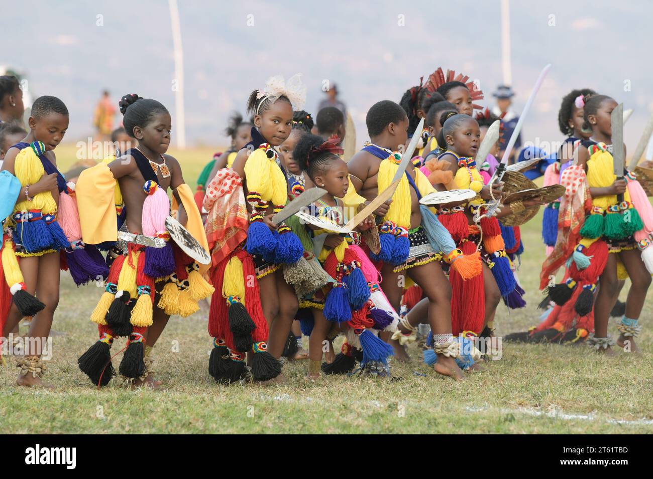 Culture event, group of female children dancing in Umhlanga reed dance festival 2023, Kingdom of Eswatini, African cultural activity, young girls Stock Photo