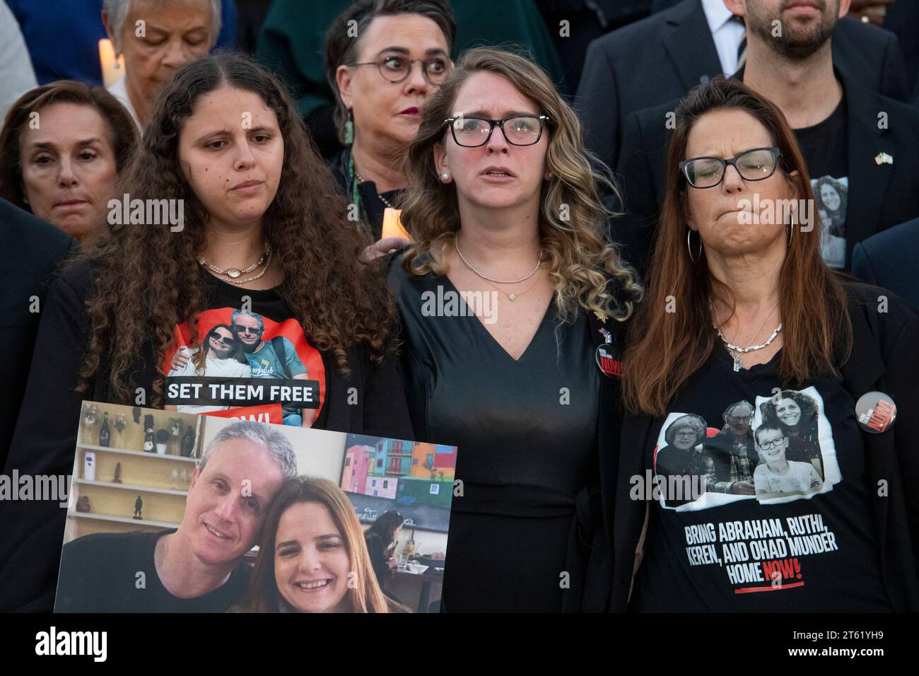 Shani Segal, center, fights back tears as Congressional Members are joined by family members of Israeli victims and Hamas hostages during a bipartisan candlelight vigil at the US Capitol in Washington, DC, Tuesday, November 7, 2023. Ms. Segal's cousin Rimon Buchshtav and her husband Yagev were taken hostage by Hamas militants during the historic and deadly Hamas attack of October 7, 2023. Credit: Rod Lamkey/CNP /MediaPunch Stock Photo