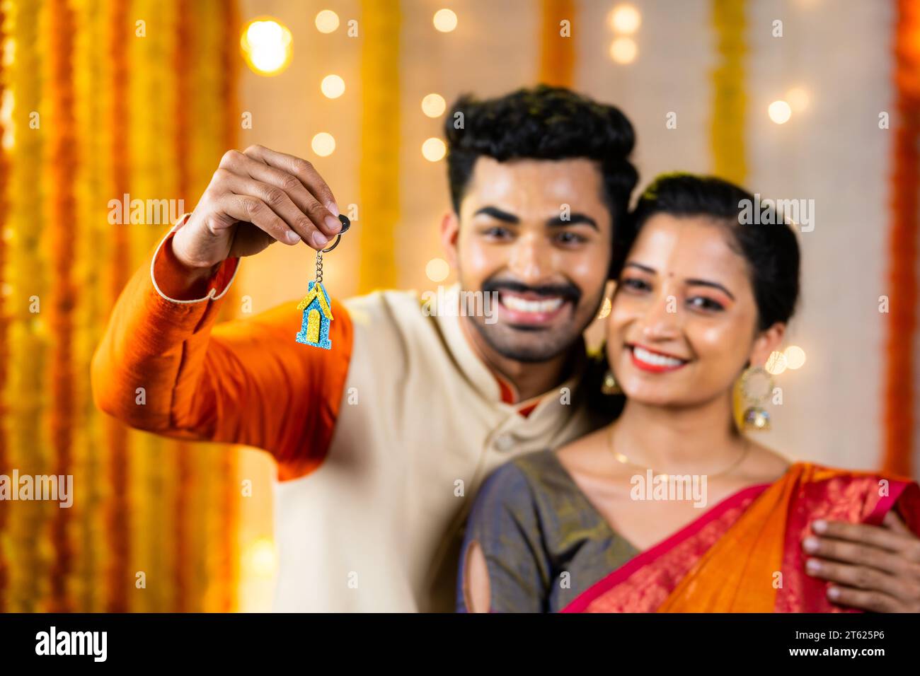 Indian couple holding house keys hi-res stock photography and images ...