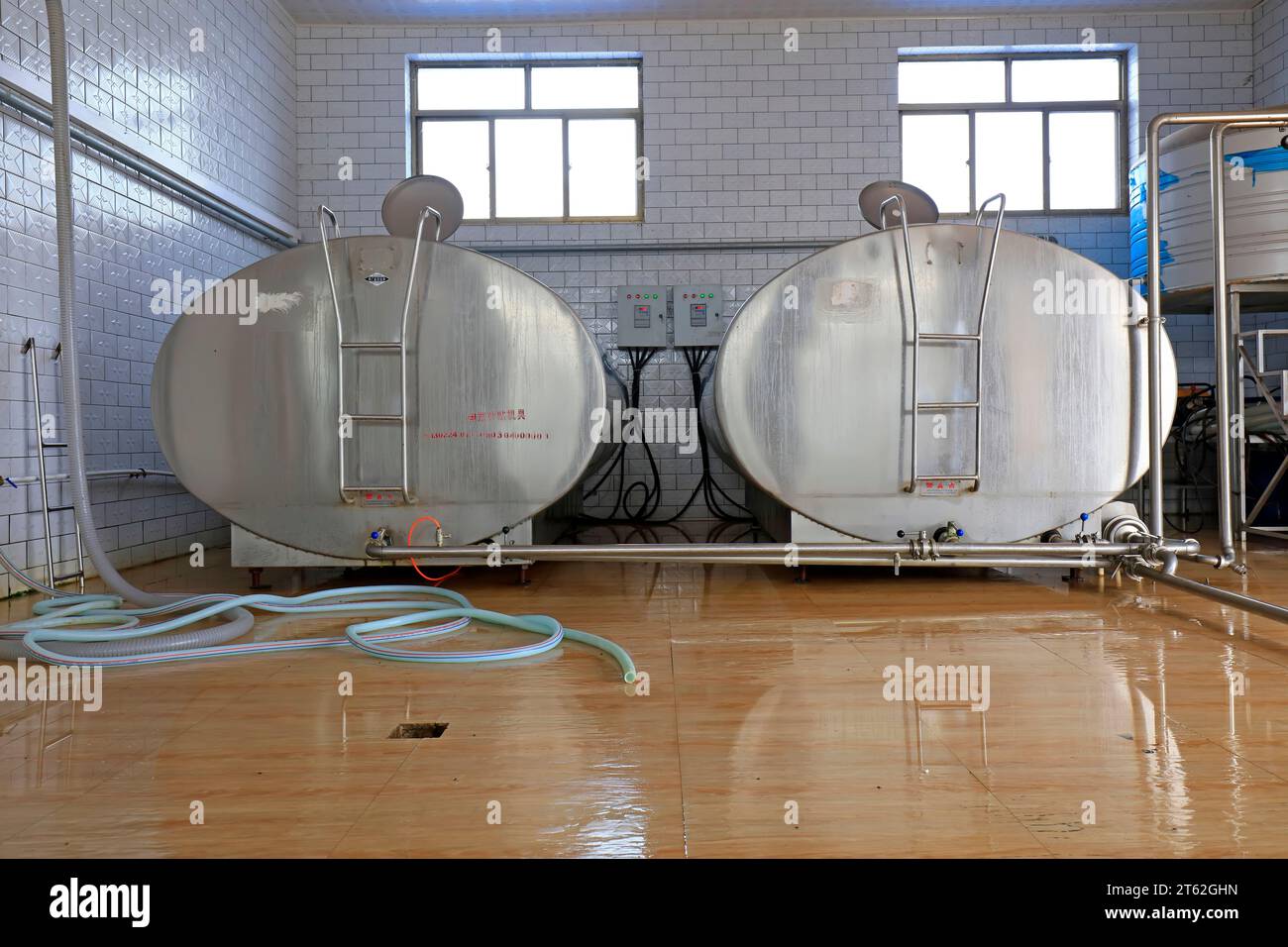 Milk storage tank in dairy farm Stock Photo - Alamy