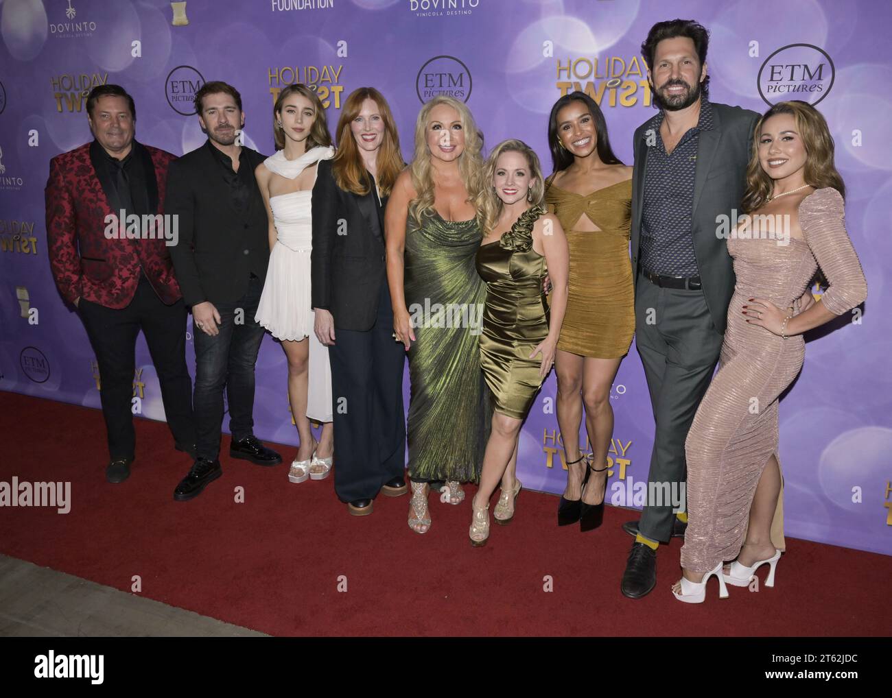 November 7, 2023, Hollywood, California, United States: (L-R) Jeff Rector, guest, Caylee Cowan, Sadie Stratton, Stephanie Garvin, Kelly Stables, Melody Thorton, Brian Thomas Smith and Haley Reinhar attend the World Premiere of â€œHoliday Twistâ (Credit Image: © Billy Bennight/ZUMA Press Wire) EDITORIAL USAGE ONLY! Not for Commercial USAGE! Stock Photo