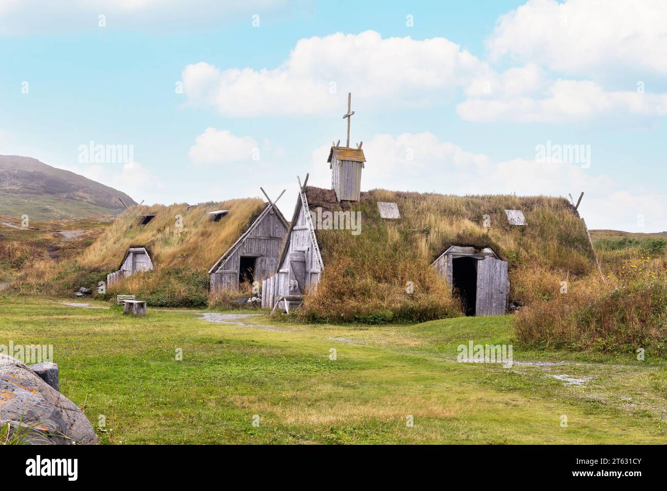 Exterior of reconstructed buildings and church, L'Anse aux Meadows UNESCO site, viking/norse settlement of a thousand years ago, Newfoundland Canada. Stock Photo