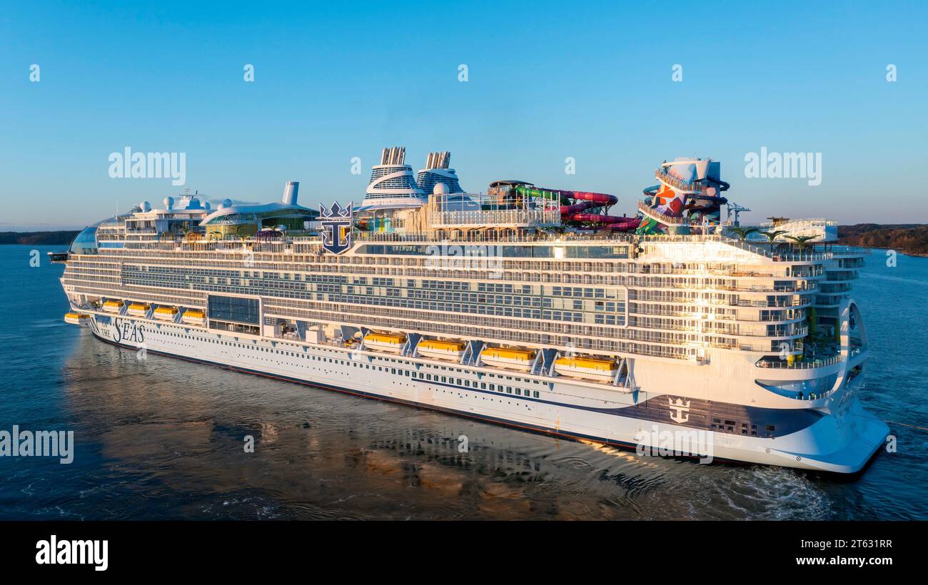 World's largest cruise ship ICON OF THE SEAS during second sea trials in Finnish archipelago. Aerial side view Stock Photo