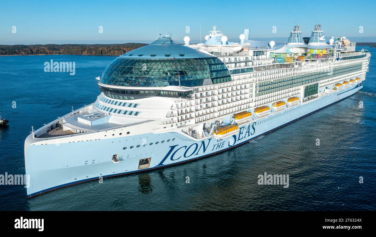 World's largest cruise ship ICON OF THE SEAS during second sea trials in Finnish archipelago. Aerial side view Stock Photo