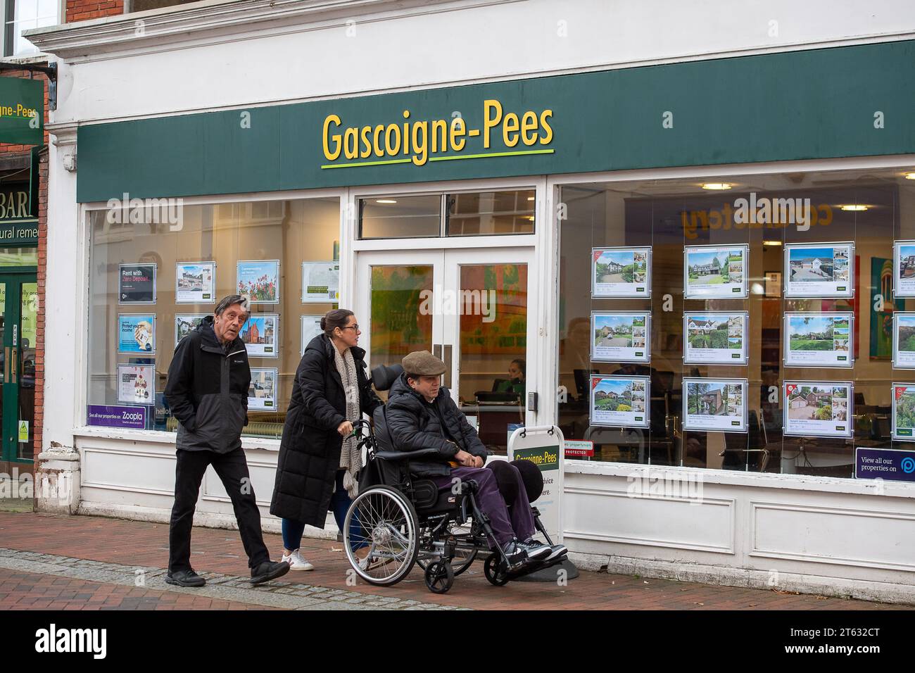 Godalming, Surrey, UK. 7th November, 2023. People walk past an Estate