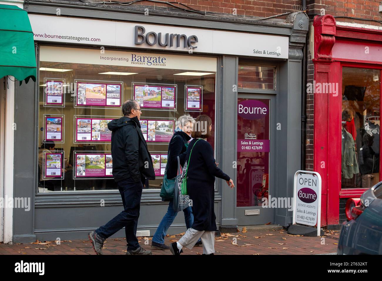 Godalming, Surrey, UK. 7th November, 2023. People walk past an Estate
