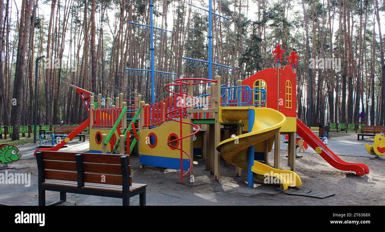 Large playground with active entertainment for children in the park Stock Photo