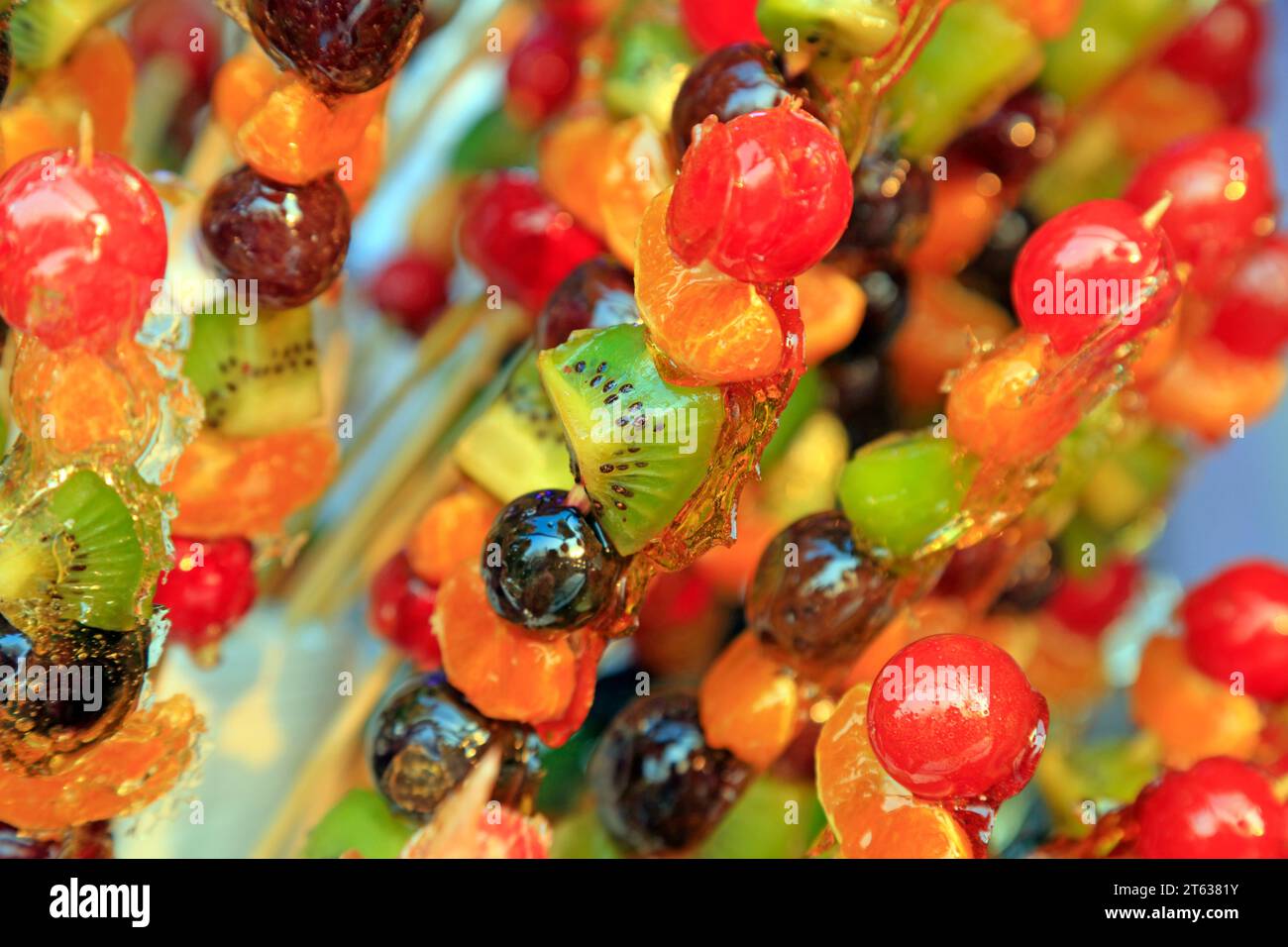 Bingtanghulu Crispy SugarCoated Fruit on a Stick Stock Photo Alamy