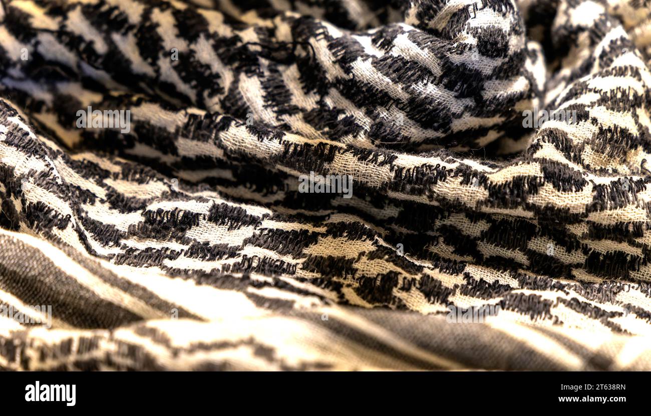 close-up of a Palestinian headscarf or kufiya. The traditional black and white headscarf of the Arab man (Keffiyeh). Selective focus Stock Photo
