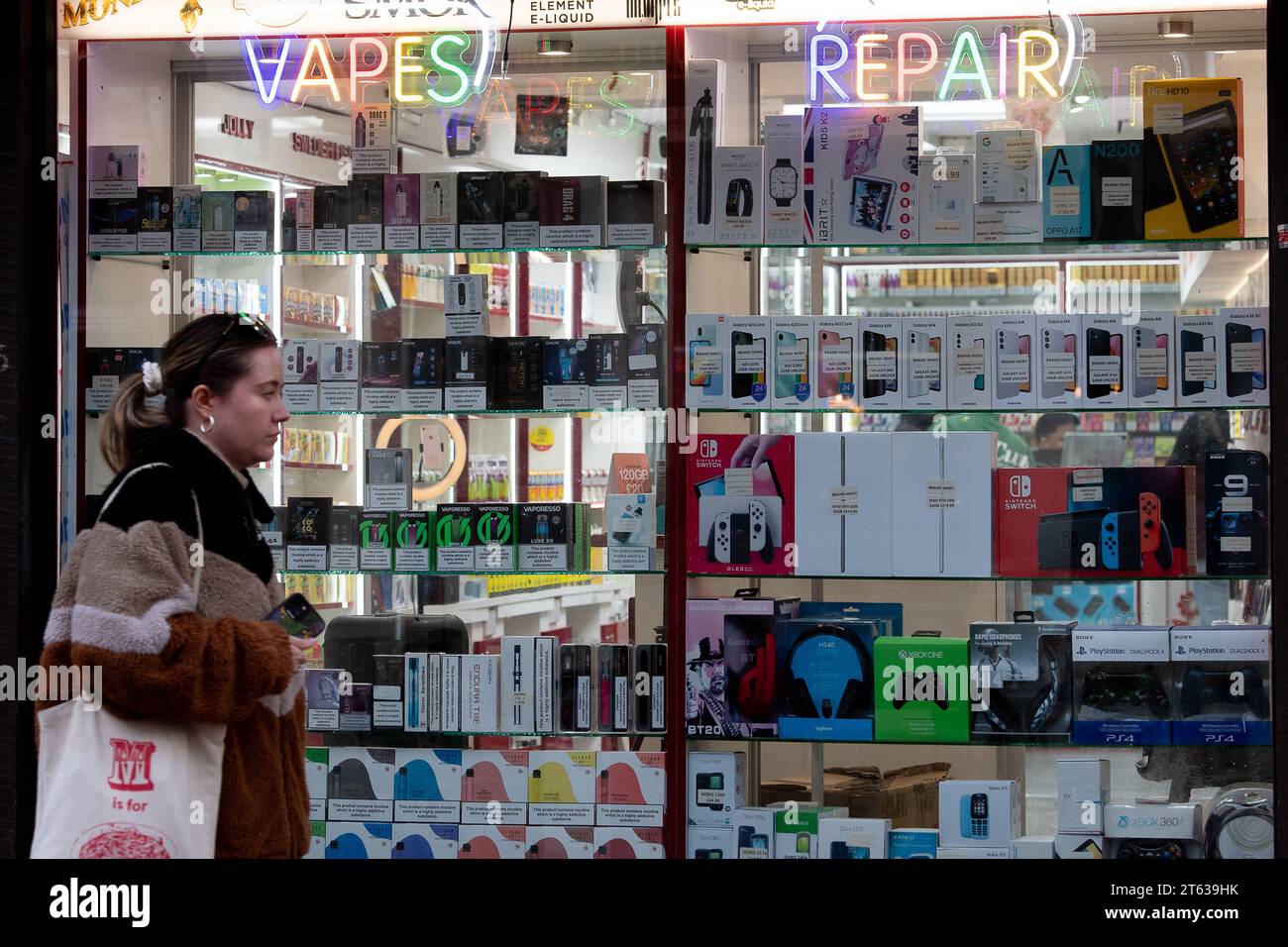 Godalming, Surrey, UK. 7th November, 2023. A Vape Store in Godalming High Street in Surrey. The Government are planning to introduce a new Tobacco and Vapes Bill next month, that would mean tighter restrictions on vaping so as to protect children's health. The plans would see the phasing out of the sale of cigarettes, so they can never be sold to children currently aged 14 or younger. The Government are also considering putting a new tax on vapes. Credit: Maureen McLean/Alamy Live News Stock Photo