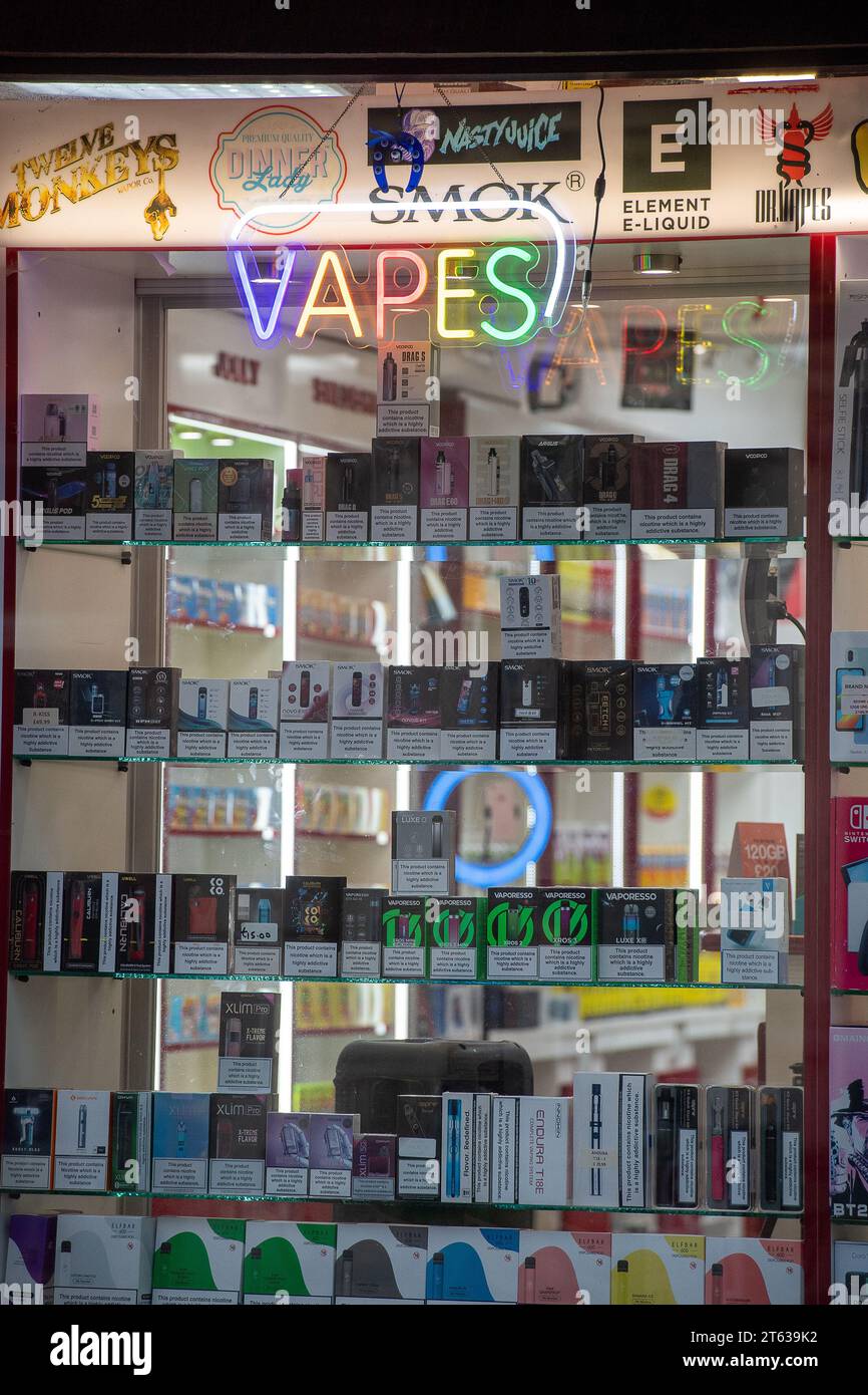Godalming, Surrey, UK. 7th November, 2023. A Vape Store in Godalming High Street in Surrey. The Government are planning to introduce a new Tobacco and Vapes Bill next month, that would mean tighter restrictions on vaping so as to protect children's health. The plans would see the phasing out of the sale of cigarettes, so they can never be sold to children currently aged 14 or younger. The Government are also considering putting a new tax on vapes. Credit: Maureen McLean/Alamy Live News Stock Photo