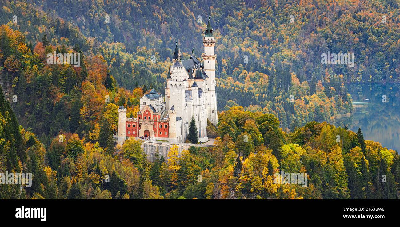 A 2:1 panorama photo from Neuschwanstein Castle surrounded by autumn colours, located close to the town of Füssen, in the Allgäu, in Bavaria, southern Stock Photo