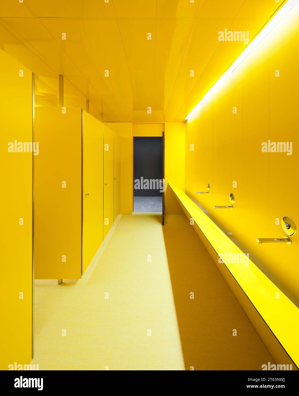 Interior of bright yellow washroom of modern biomedical research center in Pamplona; Navarra; Spain Stock Photo