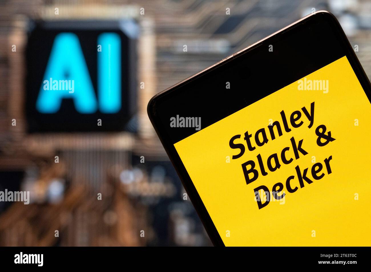 https://c8.alamy.com/comp/2T63T0C/china-3rd-nov-2023-in-this-photo-illustration-the-american-manufacturer-of-industrial-tools-and-household-hardware-stanley-black-decker-nyse-swk-logo-seen-displayed-on-a-smartphone-with-an-artificial-intelligence-ai-chip-and-symbol-in-the-background-credit-image-budrul-chukrutsopa-images-via-zuma-press-wire-editorial-usage-only!-not-for-commercial-usage!-2T63T0C.jpg