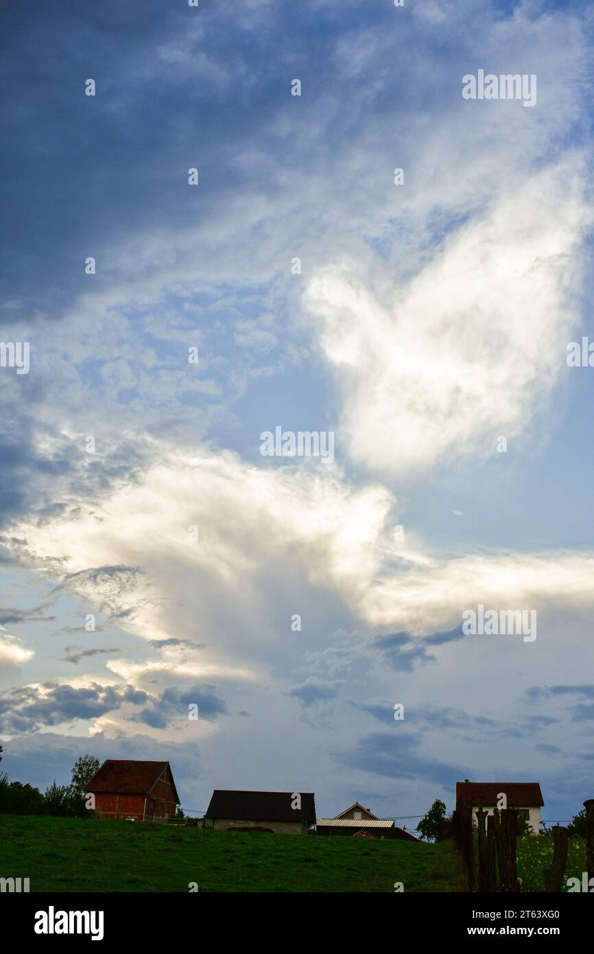 Rural idyll at dusk. Sunset and the romantic light of the sky Stock Photo