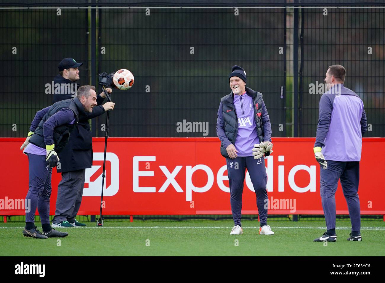 Liverpool Goalkeeping Coaches, John Achterberg, (left) and Claudio Taffarel (centre) play with the ball during a training session at the AXA Training Centre, Liverpool. Picture date: Wednesday November 8, 2023. Stock Photo