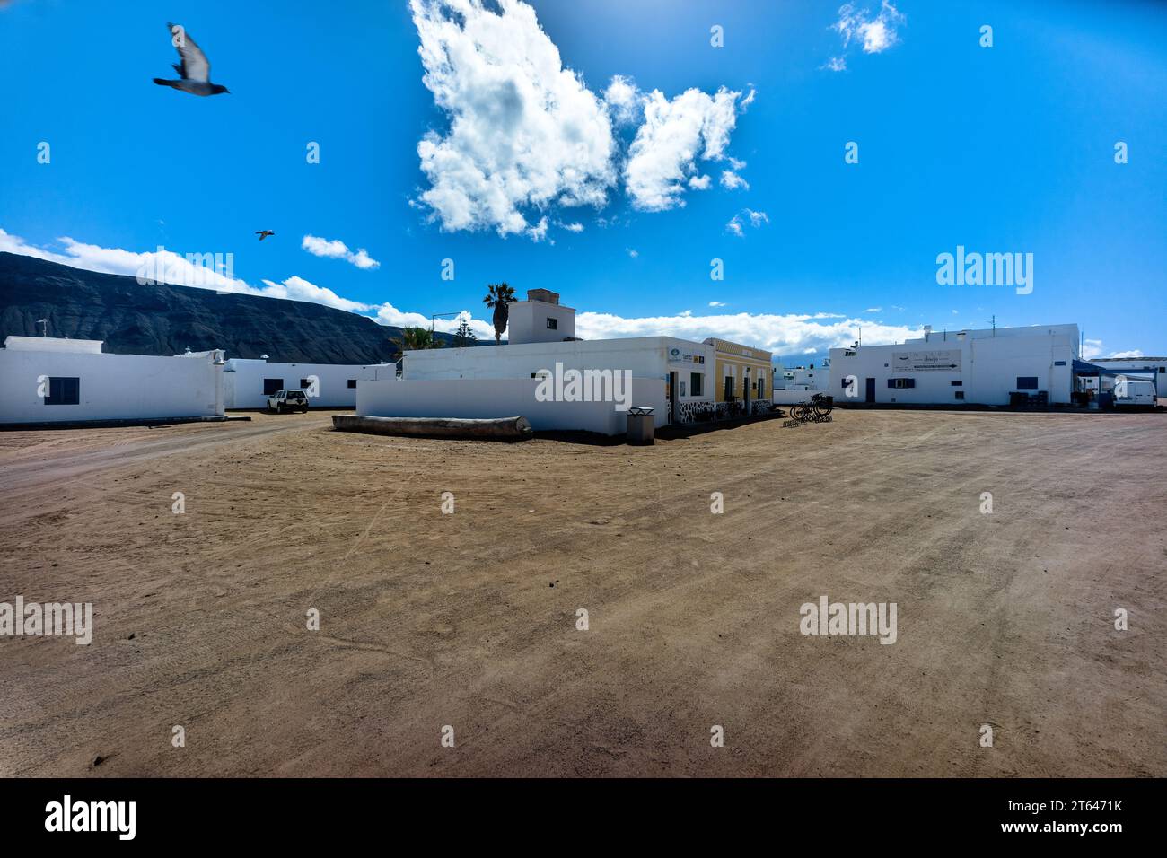 Spain, Canary Islands, La Graciosa: White buildings on the sandy streets of La Graciosa island Stock Photo