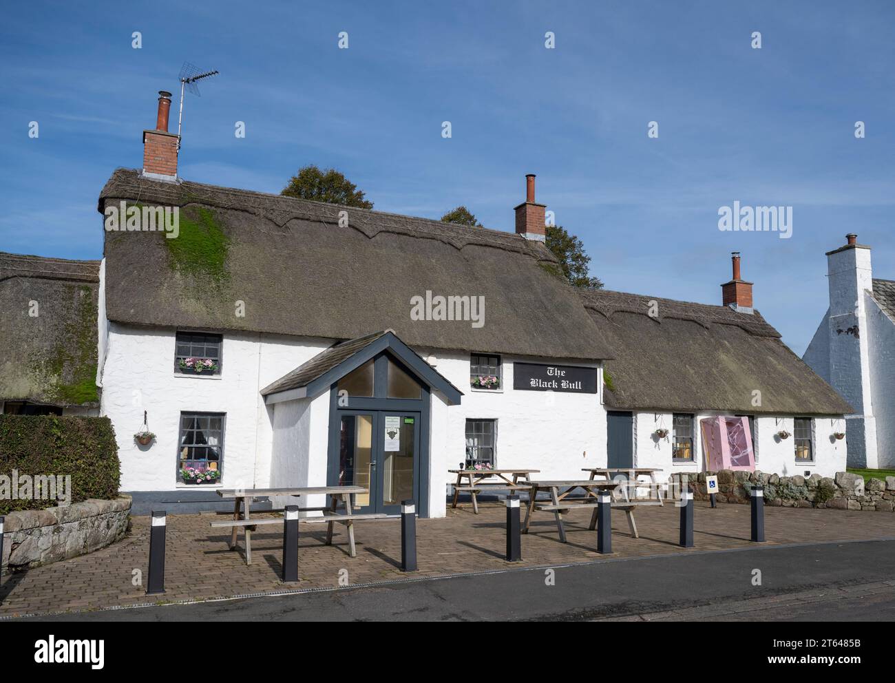 The Black Bull public house, Etal, Cornhill-on-Tweed, Northumberland, England, UK - only thatched pub in Northumberland. Stock Photo
