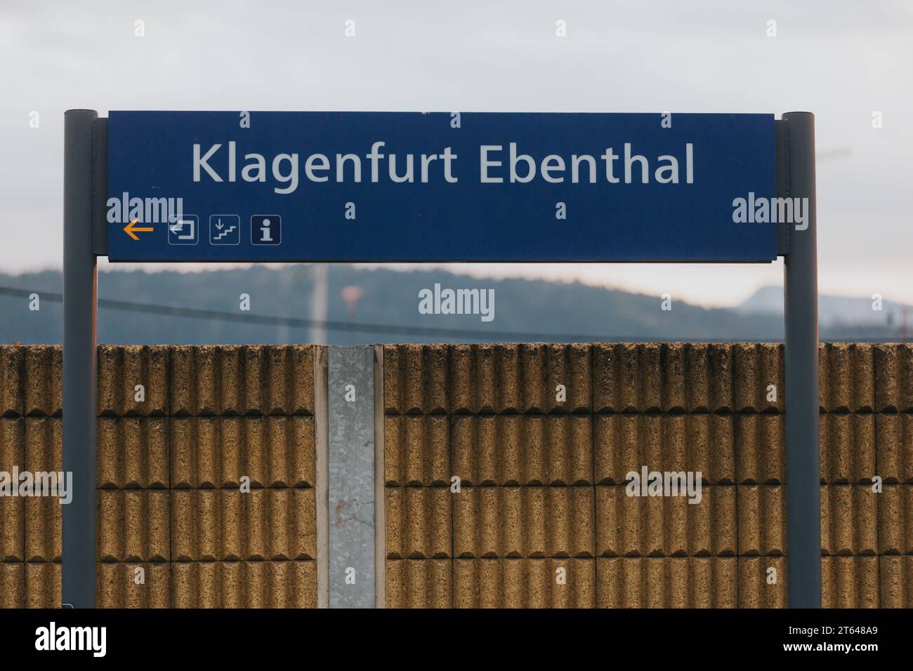 A road sign with the city names: Klagenfurt, Ebenthal Stock Photo