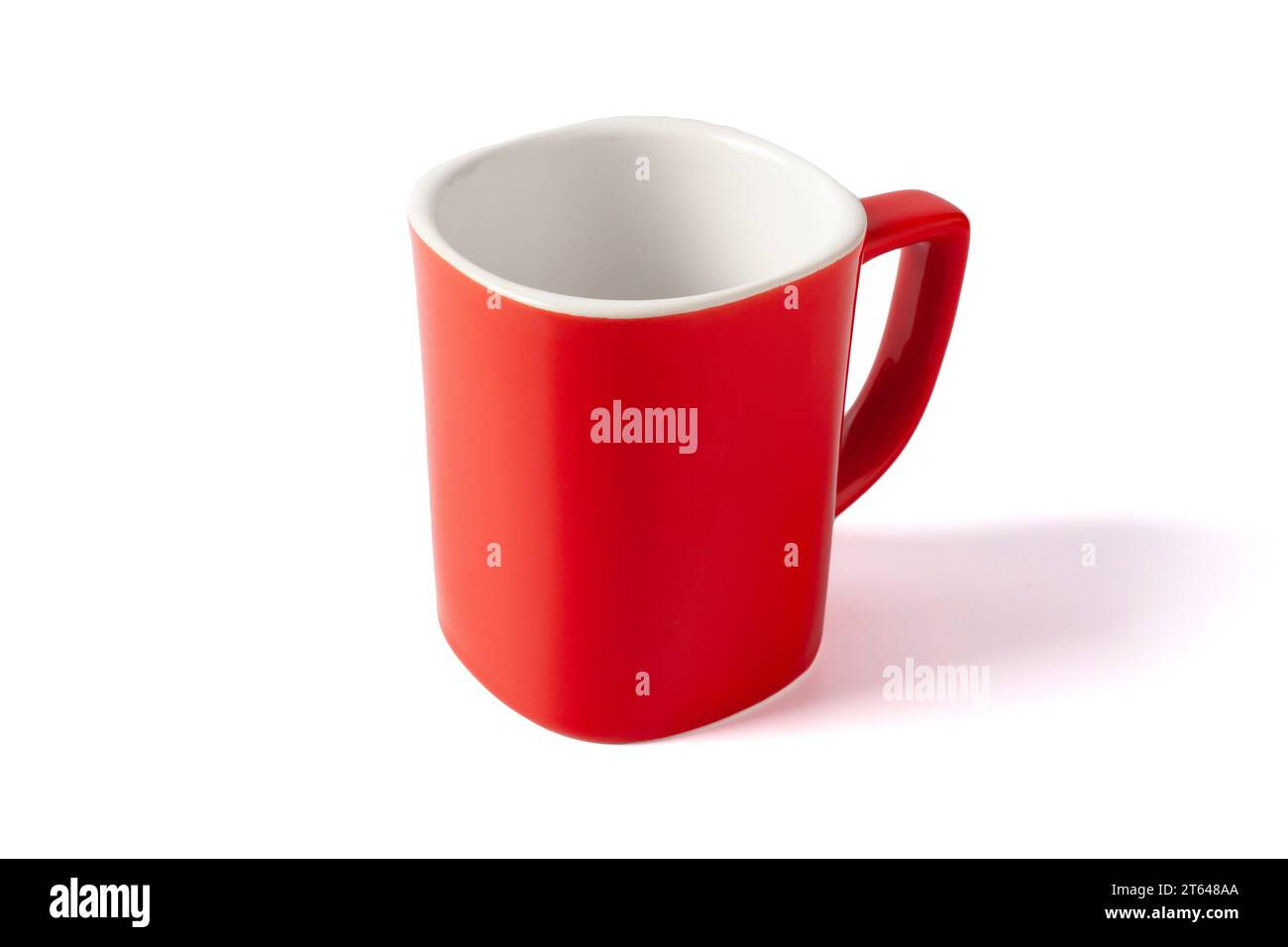 Empty red cup isolated on white background. Red mug. Stock Photo