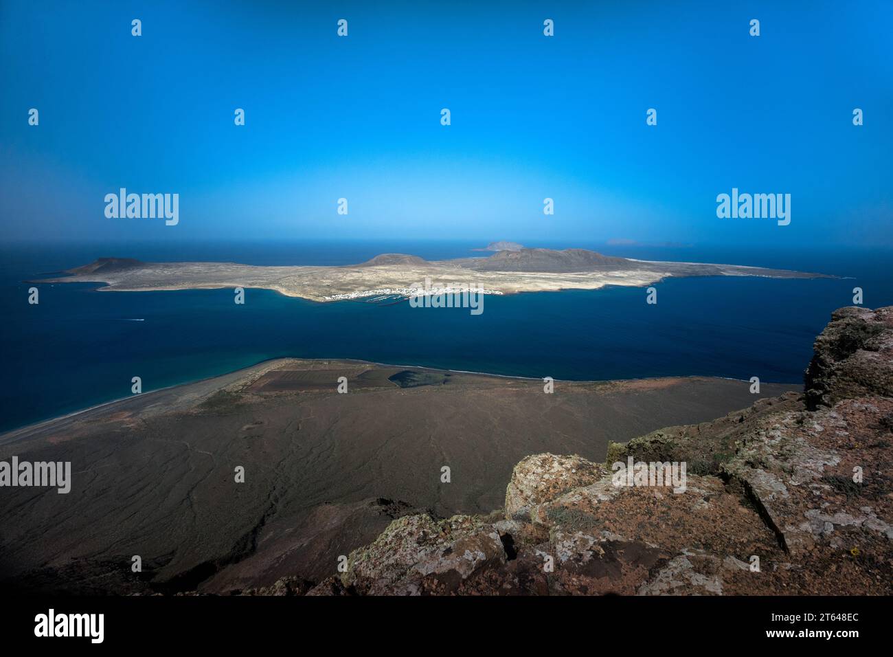 Spain, Canary Islands, La Graciosa: aerial view of the Graciosa island from the Mirador del Rio of the island of Lanzarote Stock Photo