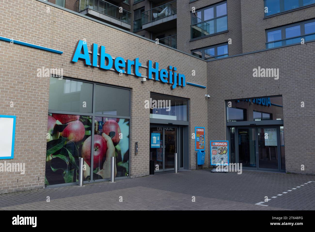 DENDERMONDE, BELGIUM; 8 NOVEMBER 2023: Exterior view of an Albert Heijn supermarket in Flanders. It is the biggest supermarket chain in the Netherland Stock Photo