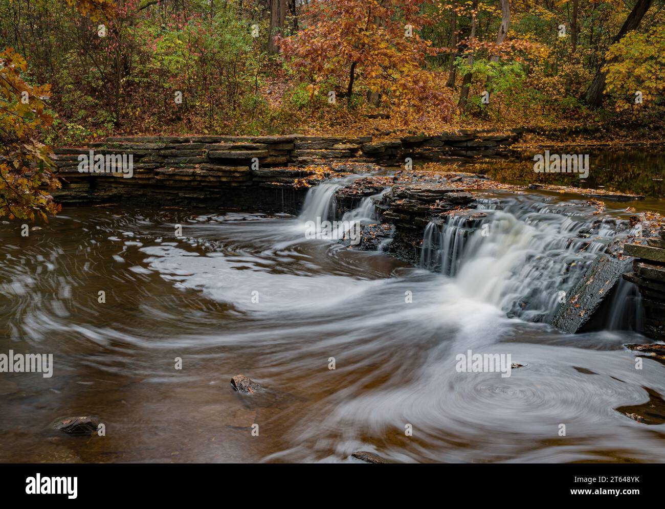 The water of Sawmill Creek flows over the very natural looking man made ...