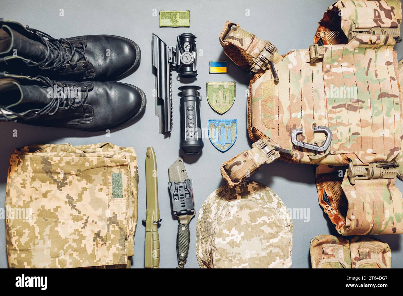 Ukrainian military gear flat lay background. Army tactical uniform