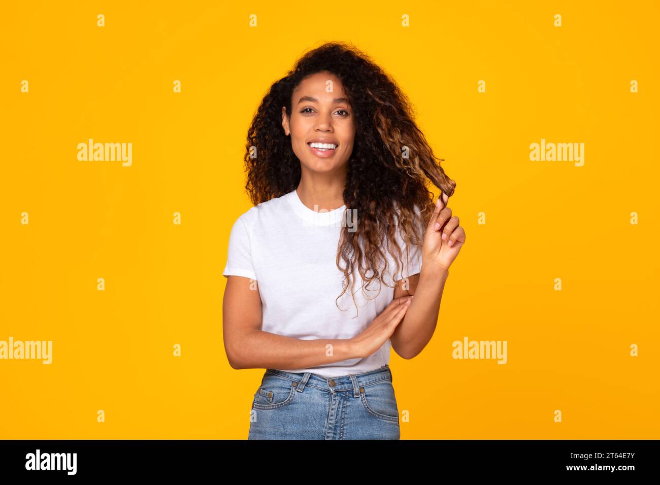 Cheerful millennial black curly hi-res stock photography and images - Alamy