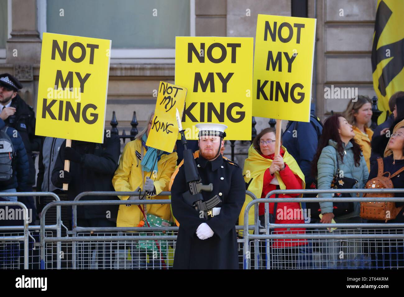 London, UK. 7th November 2023. First State Opening of the Parliament for King Charles III since his coronation. Protesters with banners and placards gather in Whitehall while naval soldiers line the street.. Stock Photo