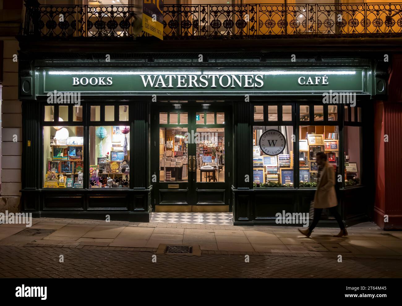 Waterstones shop front lit up at night, High Street, Lincoln City, Lincolnshire, England, UK Stock Photo