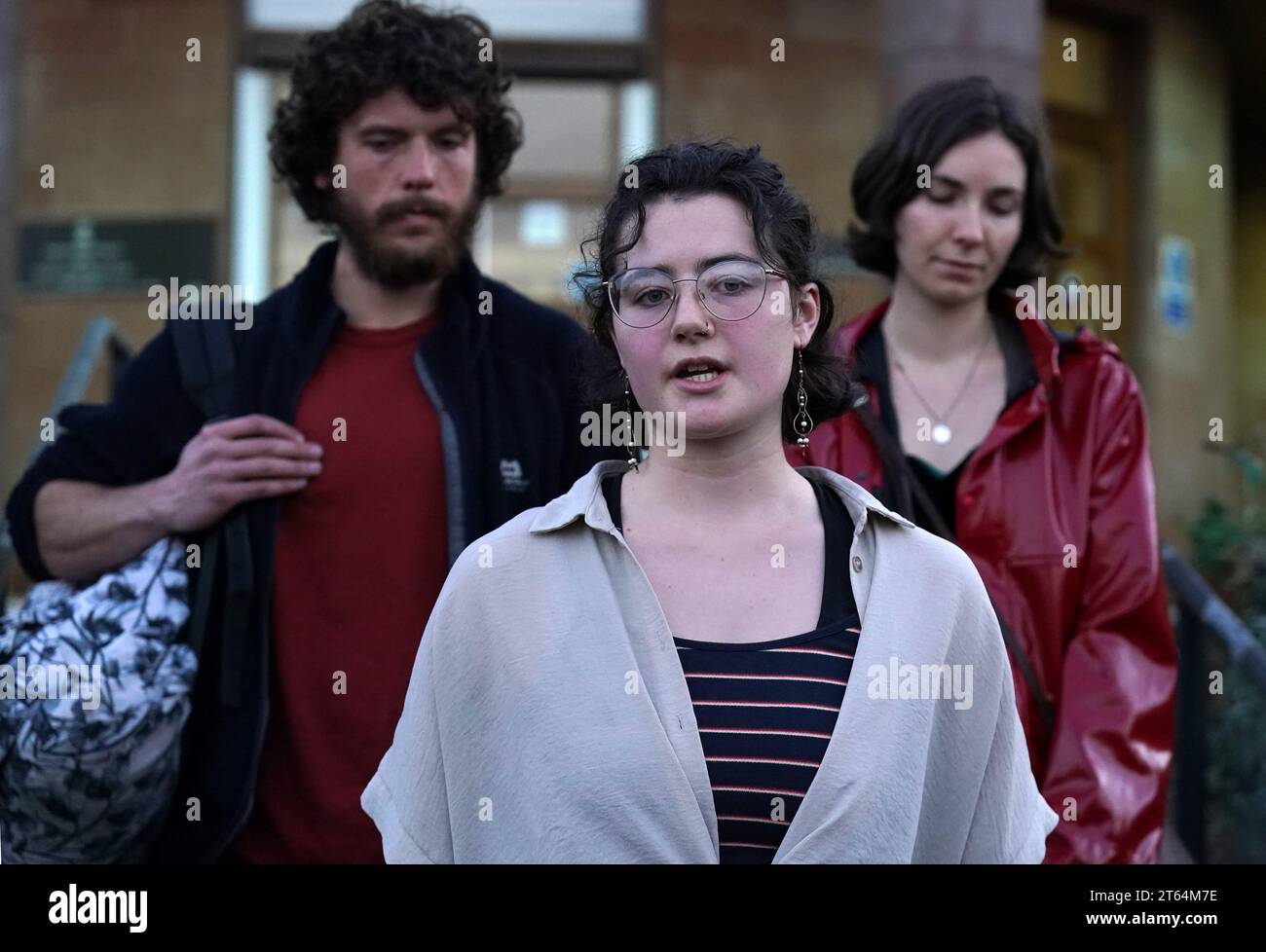 Catriona Roberts (C) alongside Ben Taylor and Romane Moulin speak to ...