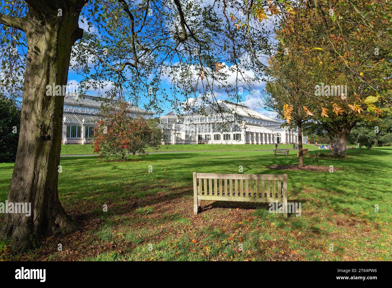 Exterior of the Temperate House in the Royal Botanic Gardens Kew on a sunny autumnal day, West London England UK Stock Photo