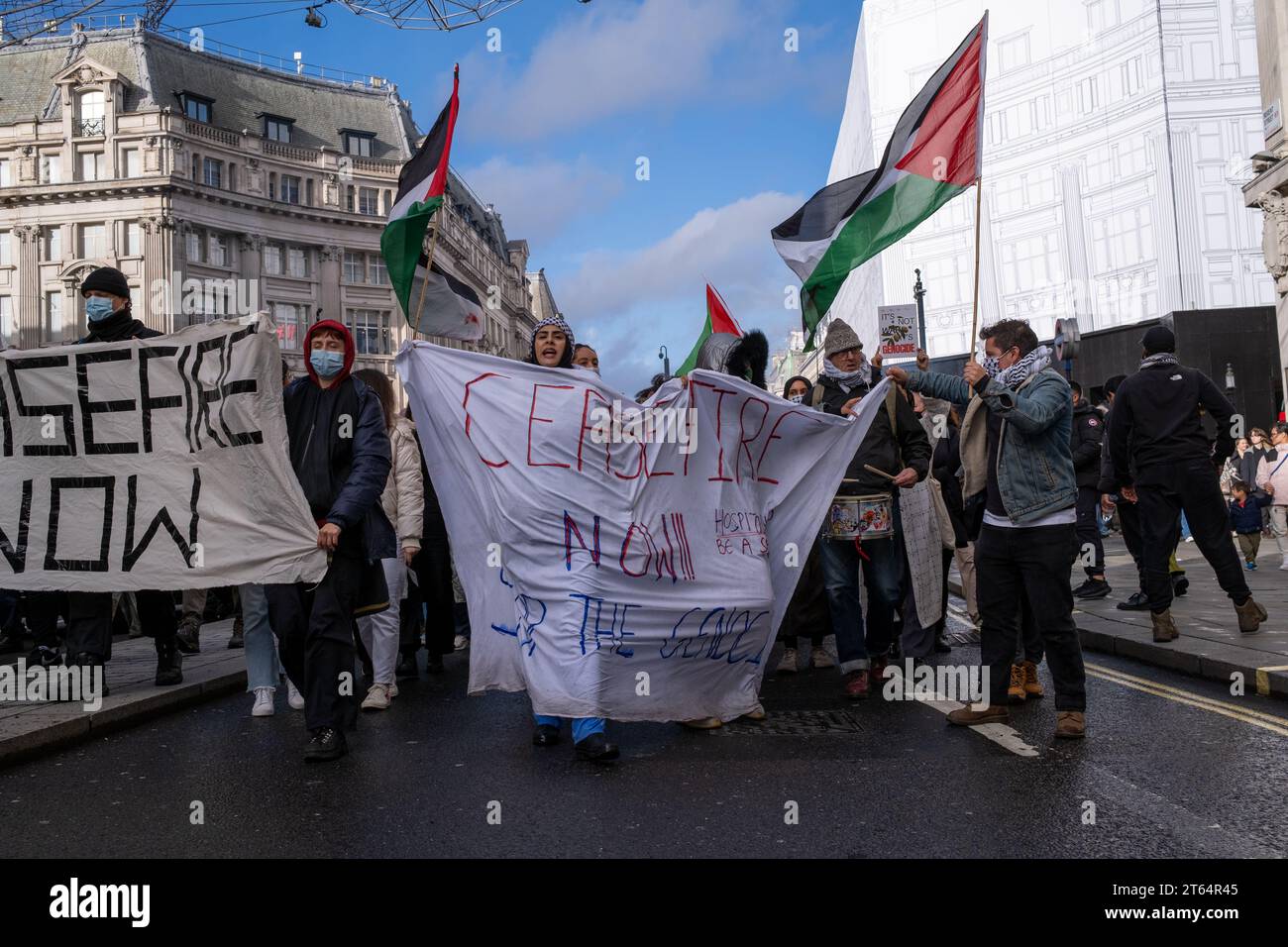 Thousands march through Central London in protest at military action by ...
