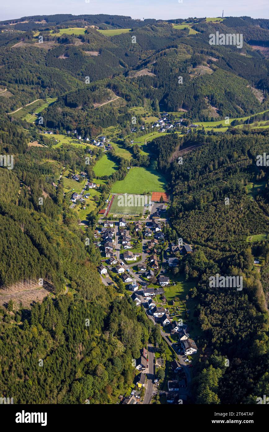 Aerial view, residential area Glingestraße and sports field, hilly landscape and forest area with forest damage, Rönkhausen, Finnentrop, Sauerland, No Stock Photo