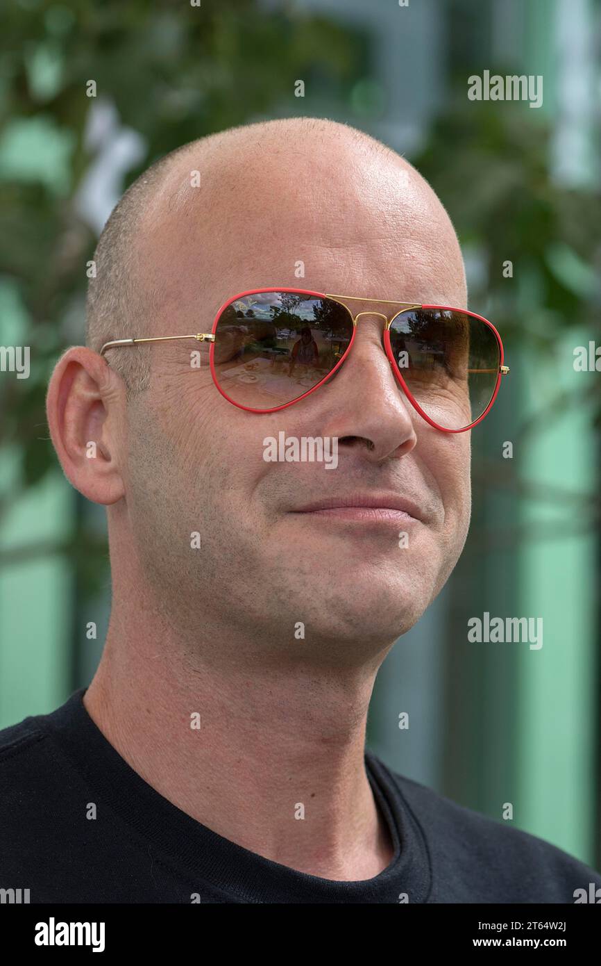 Bald, Young man with sunglasses, Baden-Wuerttemberg, Germany Stock Photo