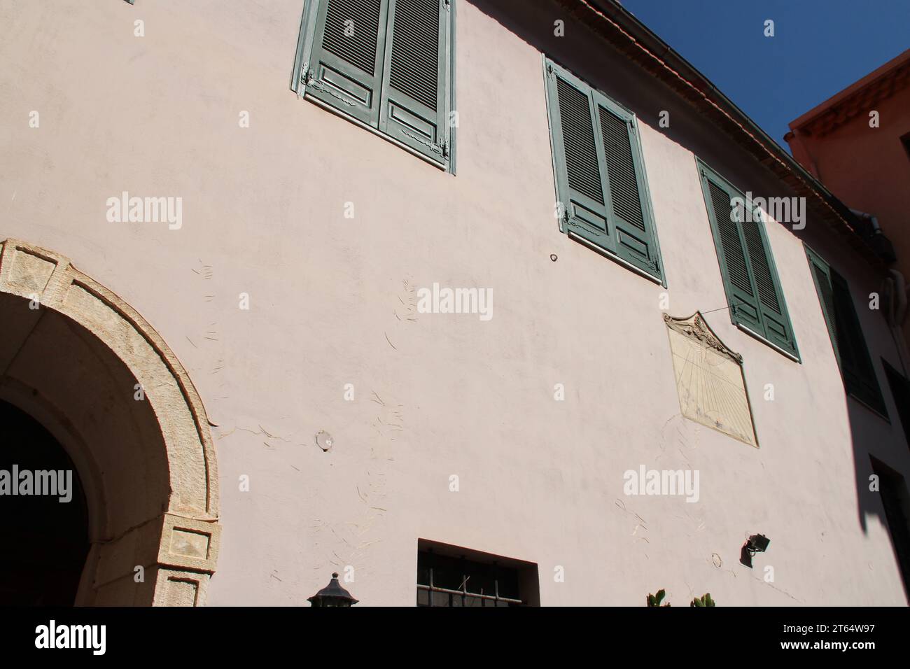 sundial on the facade of a building in chania in crete in greece Stock Photo