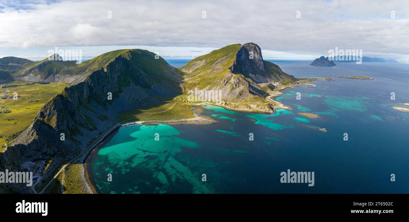 Mountains and coast of the island of Vaeroy, Vaeroy, Lofoten, Norway Stock Photo