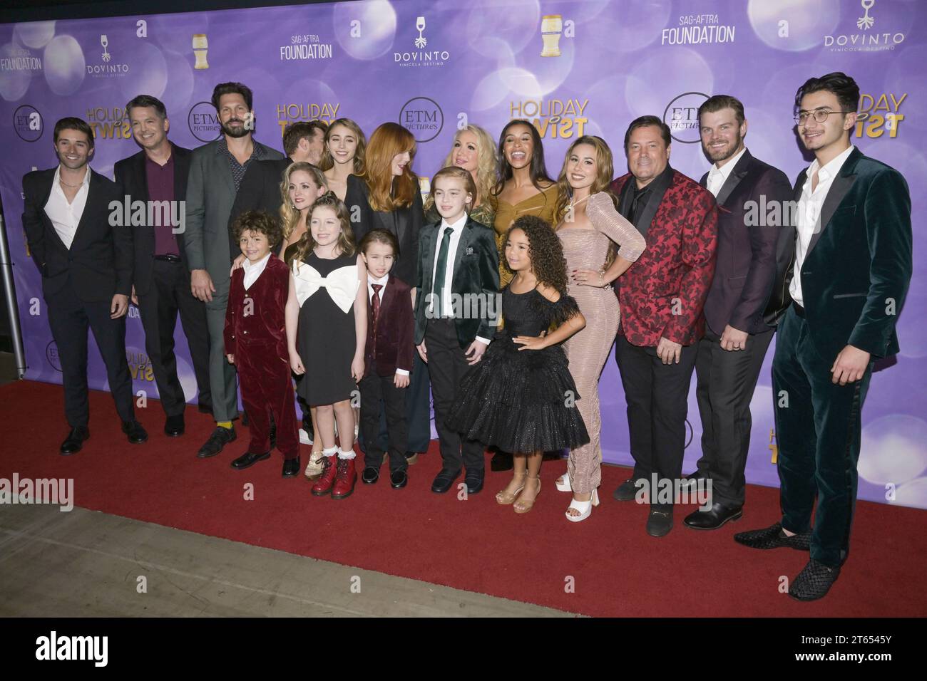 November 7, 2023, Hollywood, California, United States: (L-R) Jeff Rector, Caylee Cowan, Sadie Stratton, Stephanie Garvin, Kelly Stables, Melody Thorton, Brian Thomas Smith and Haley Reinhard attend the World Premiere of â€œHoliday Twistâ (Credit Image: © Billy Bennight/ZUMA Press Wire) EDITORIAL USAGE ONLY! Not for Commercial USAGE! Stock Photo