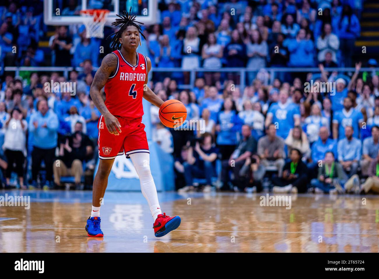 Chapel Hill, NC, USA. 6th Nov, 2023. Radford Highlanders guard Truth Harris (4) with the ball during the second half against the North Carolina Tar Heels in the NCAA basketball matchup at Dean Smith Center in Chapel Hill, NC. (Scott Kinser/CSM). Credit: csm/Alamy Live News Stock Photo