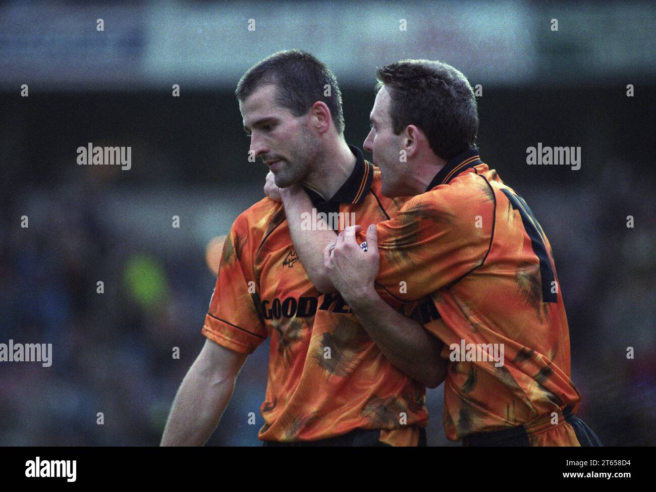 WOLVES V BRISTOL AT MOLINEUX 7/11/1992 (5-1) Cheer up Bully you have just scored. Robbie Dennison with Steve Bull Stock Photo