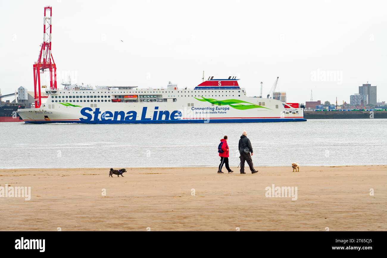 The Stena Embla Ferry operating between Birkenhead and Belfast, here passing New Brighton and Liverpool in October 2023. Stock Photo