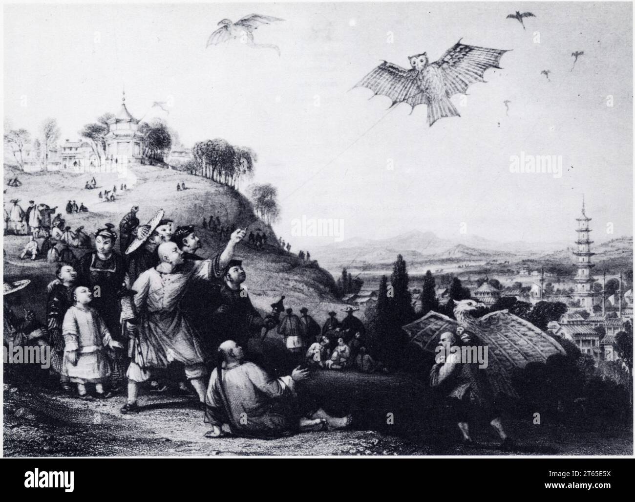 Lancement d'un modèle de cerf-volant au dessus de la ville de Haikwa en Chine. Gravure. XIX ème siècle Stock Photo