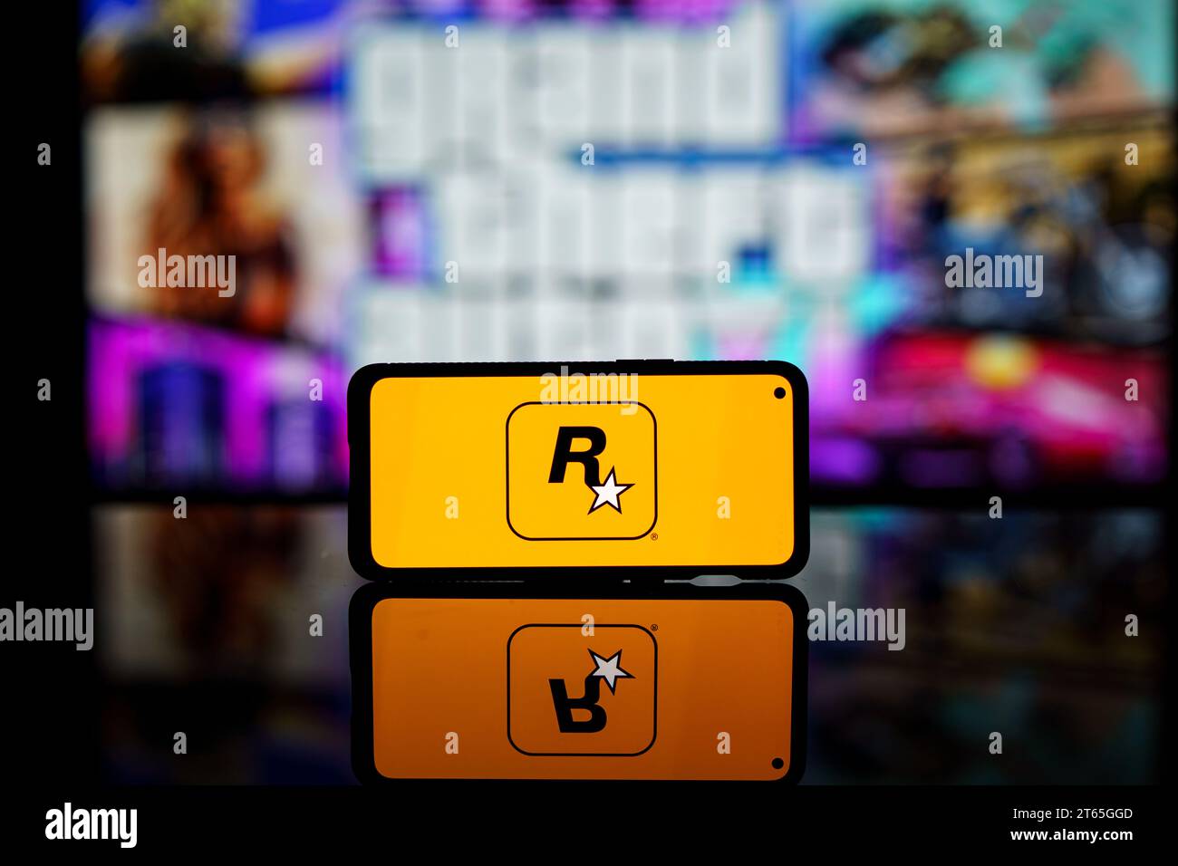 Rockstar games company logo on screen. Rockstar is international computer games developer Stock Photo