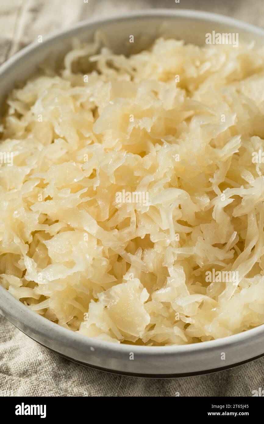 Organic Raw Cabbage Sauerkraut  in a Bowl Stock Photo