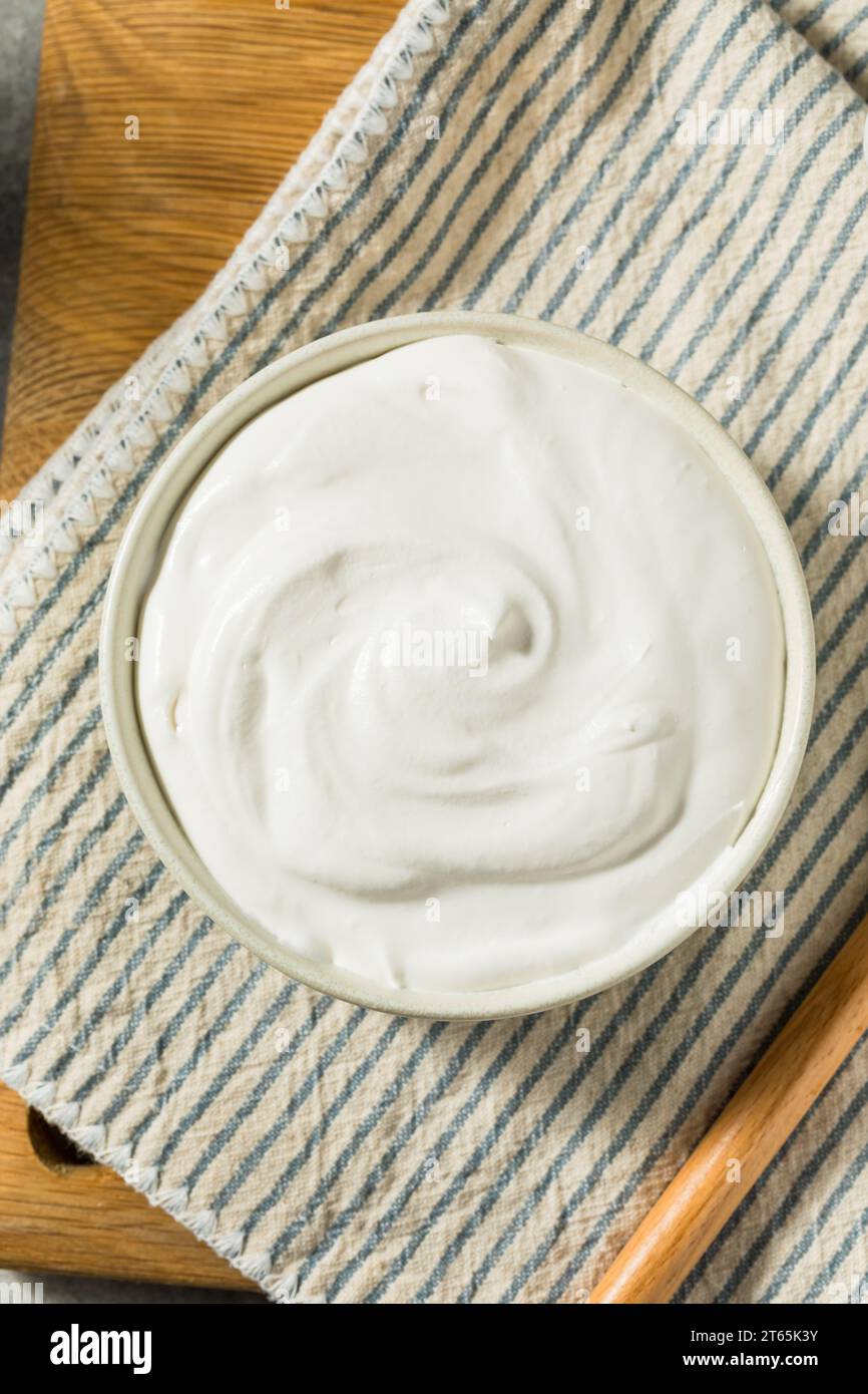 Sweet White Whipped Cream Dessert in a Bowl Stock Photo